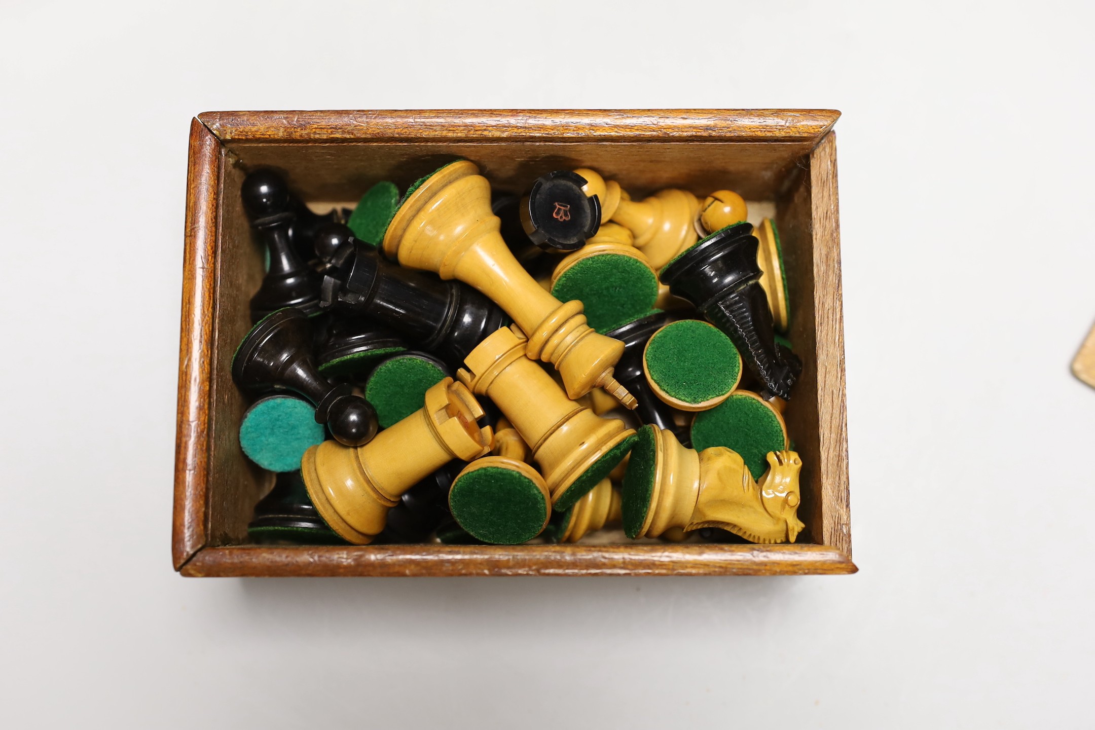 A Staunton pattern boxwood and ebony chess set, kings 7.5cm high and a boxed games compendium